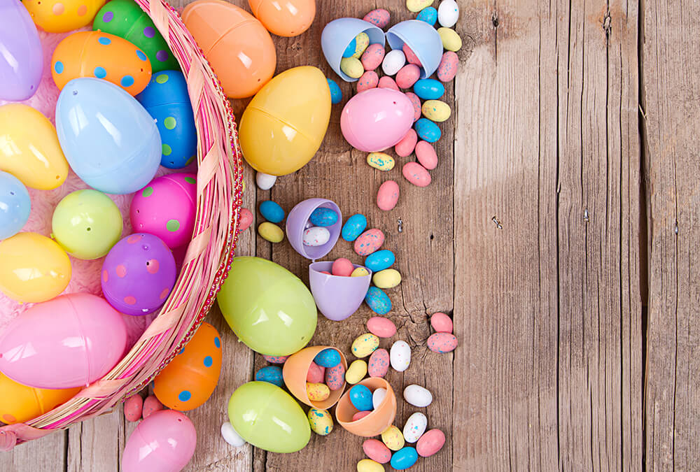 Plastic Easter eggs filled with candy in a basket