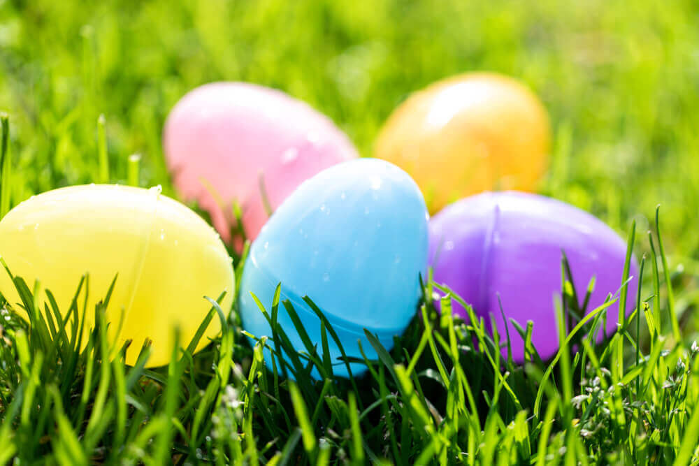 Plastic Easter eggs lying on the grass